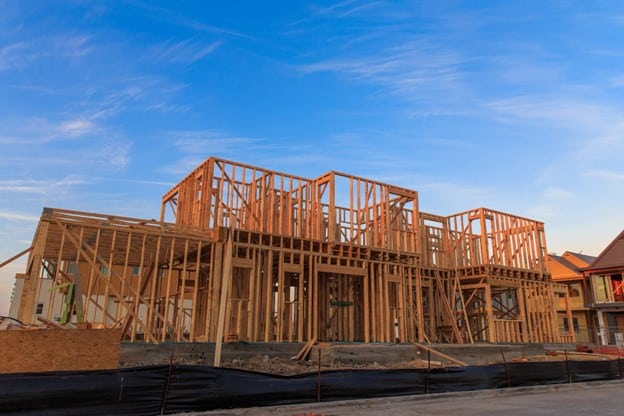 A building under construction with blue sky